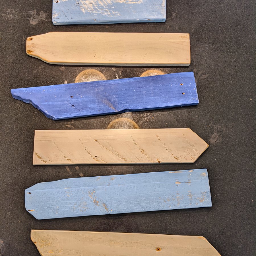 Cut boards ready to be painted for a Cape Cod sign