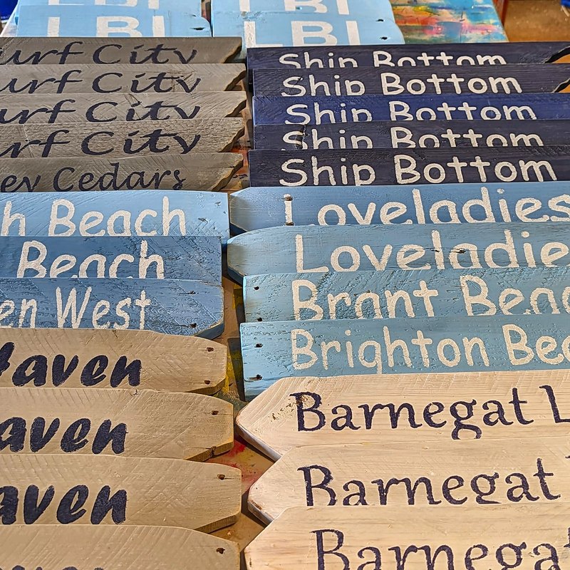 Many finished signs with different town names