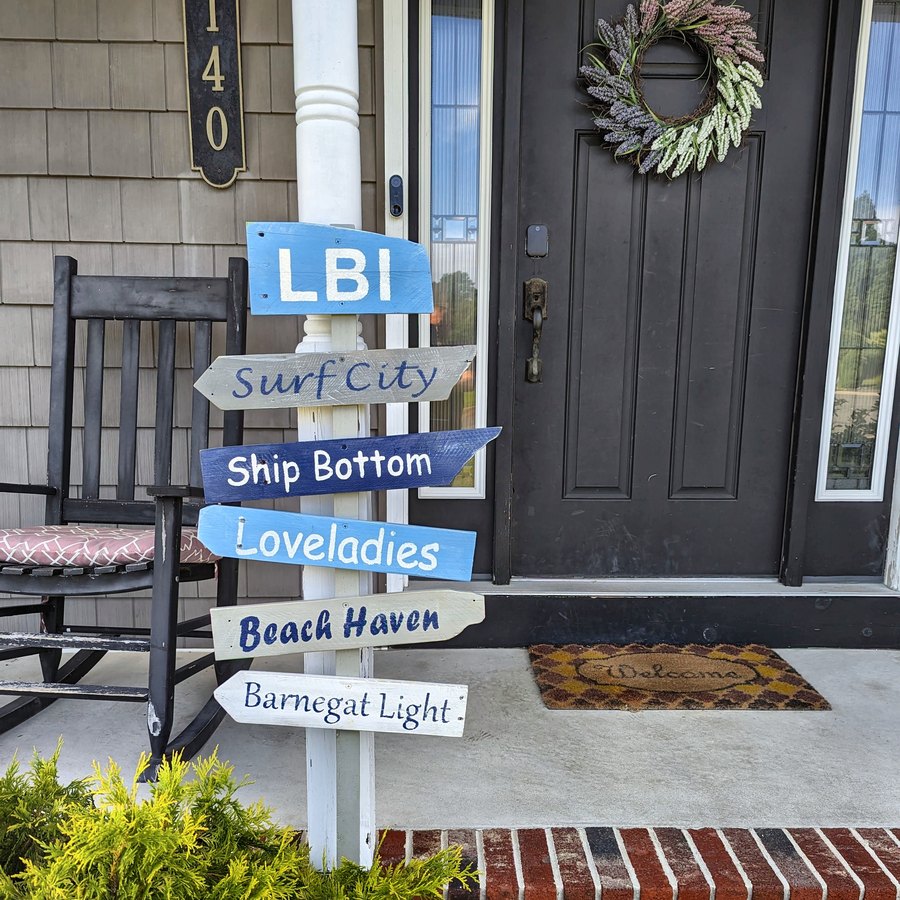 A Loveladies LBI sign by a front door